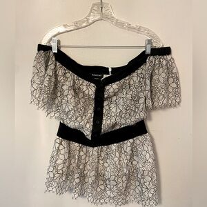 Bebe lace white and black floral shoulderless top.